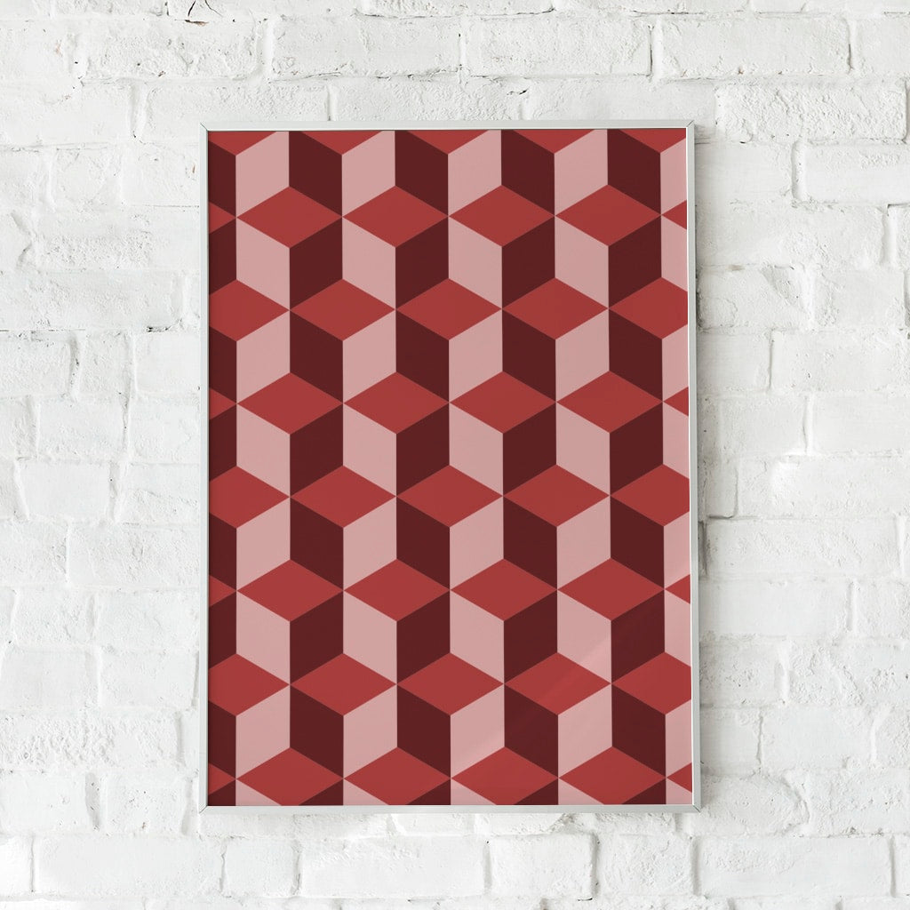Geometrisk plakat med tredimensionelt kubemønster i røde og lyserøde nuancer.