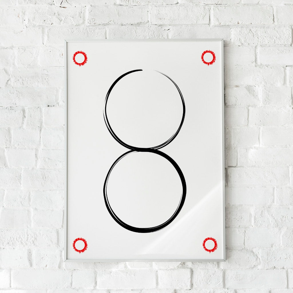 Minimalistisk plakat med to sorte cirkler og røde detaljer. Skaber balance og fokus.