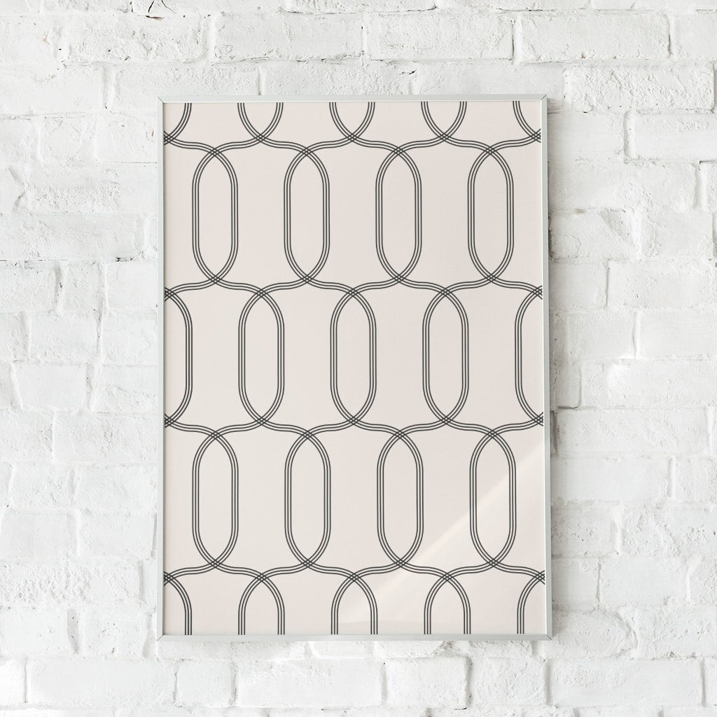Geometrisk plakat med symmetriske ovale former i sort og creme.	