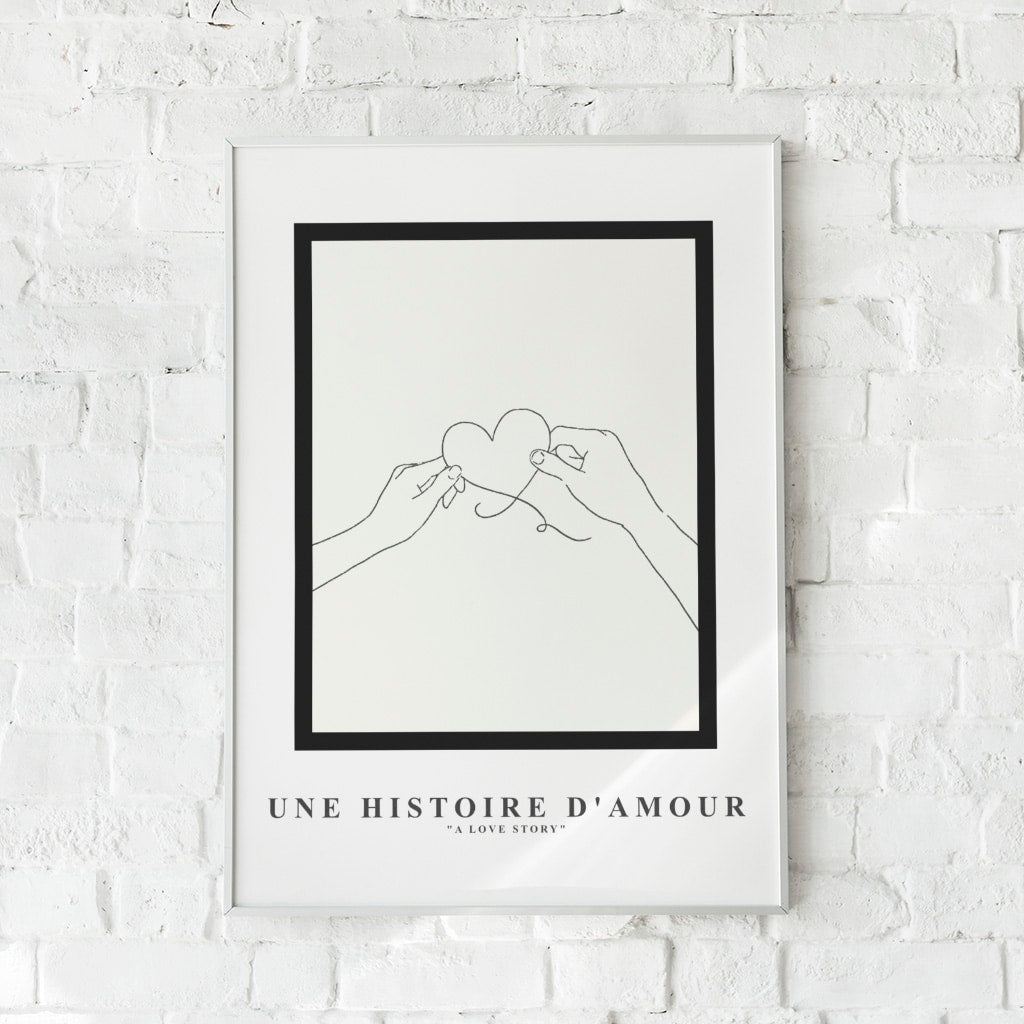 Romantisk plakat med to hænder og en hjerteform.	